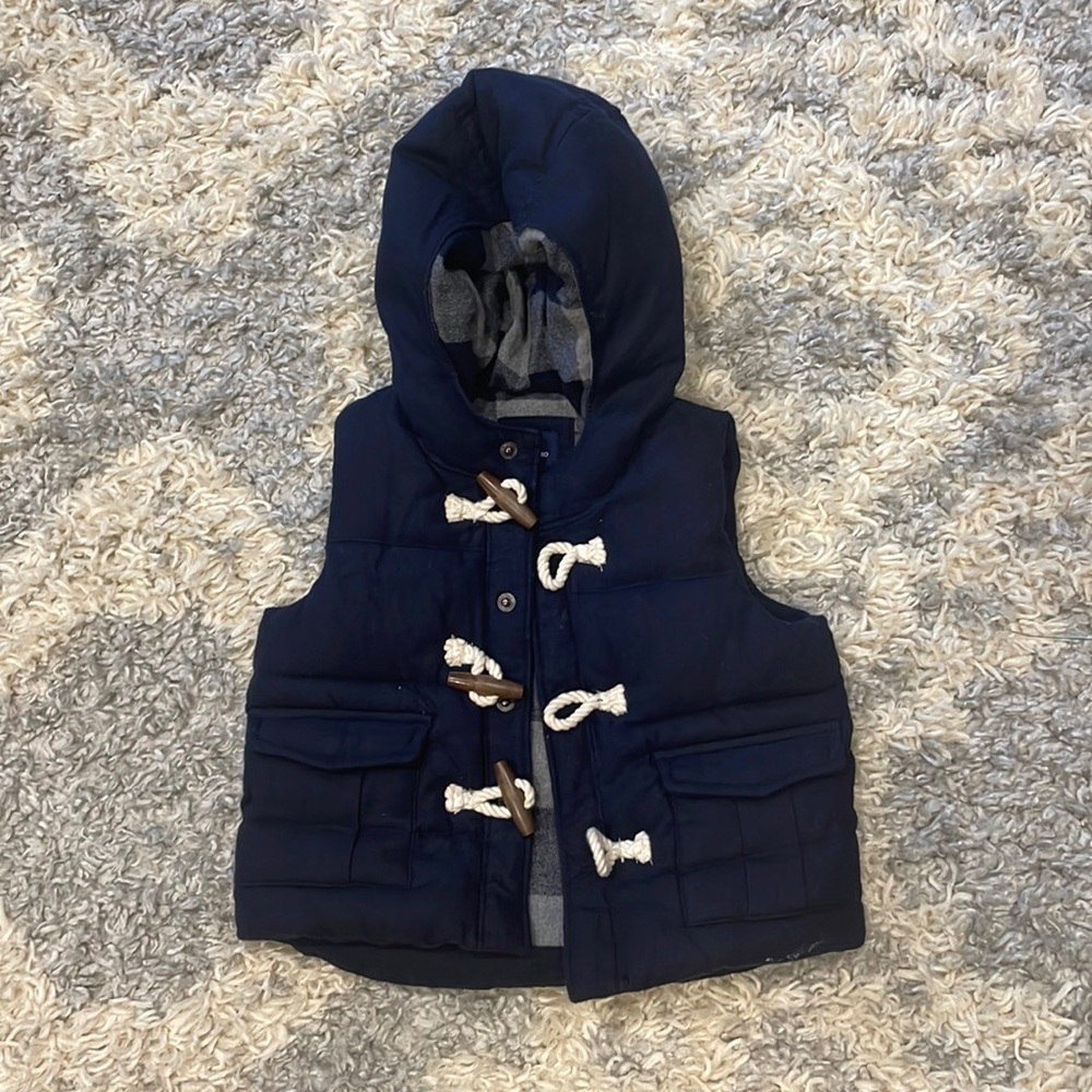 Like new! Toggle navy blue 18-24 baby gap vest! Adorable highly recommend